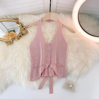 Sieviešu trikotāžas topiņš ar pogām un saitēm