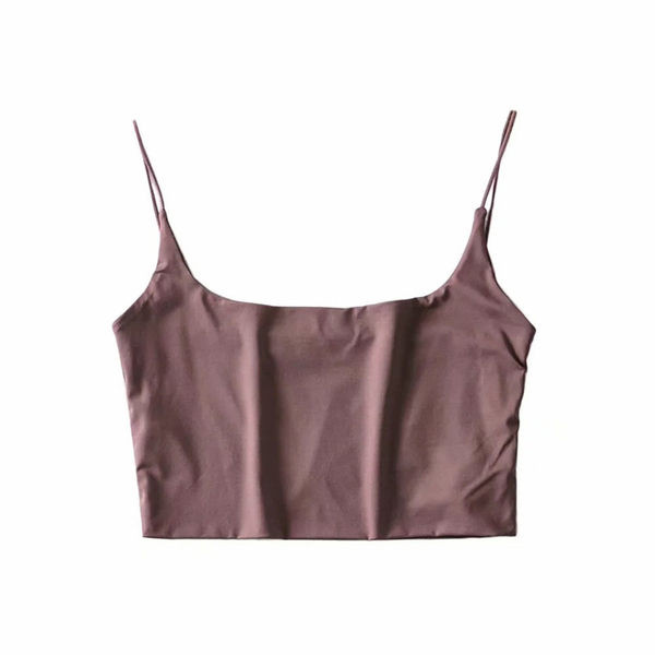 Stilīgs sieviešu īss krūtis ar plānām lencēm, vienkāršs modelis