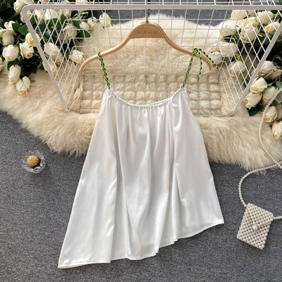 Sieviešu bikses asimetrisks modelis ar lencēm