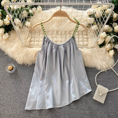 Sieviešu bikses asimetrisks modelis ar lencēm