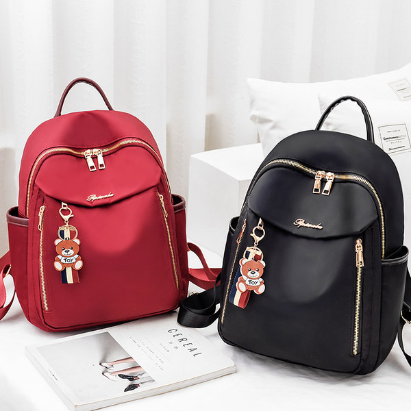 Ženski svakodnevni ruksak s patentnim zatvaračem i 3D elementom