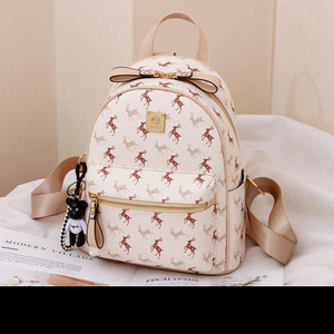 Sieviešu ikdienas mugursoma no eko ādas - ar priekšējo kabatu