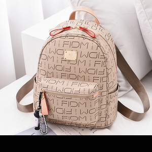 Sieviešu ikdienas mugursoma no eko ādas - ar priekšējo kabatu