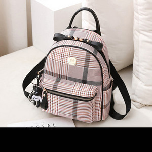 Sieviešu ikdienas mugursoma no eko ādas - ar priekšējo kabatu