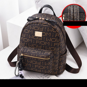 Sieviešu ikdienas mugursoma no eko ādas - ar priekšējo kabatu