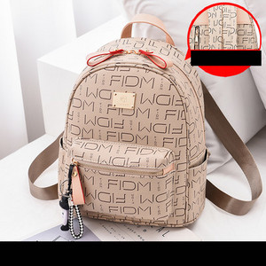 Sieviešu ikdienas mugursoma no eko ādas - ar priekšējo kabatu