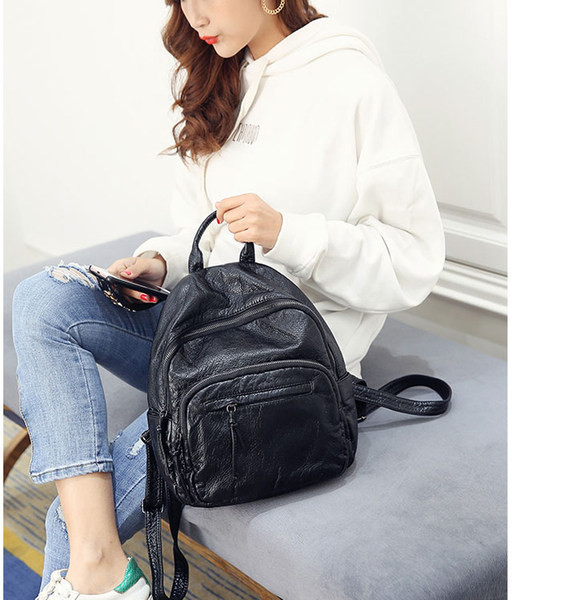 Sieviešu mākslīgās ādas mugursoma un priekškabata