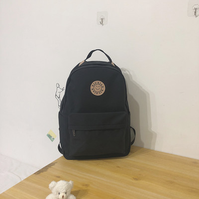 Rucsac modern pentru femei cu buzunar frontal și element 3D