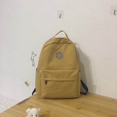 Rucsac modern pentru femei cu buzunar frontal și element 3D