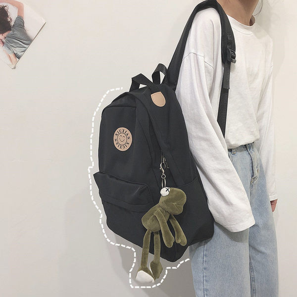 Rucsac modern pentru femei cu buzunar frontal și element 3D