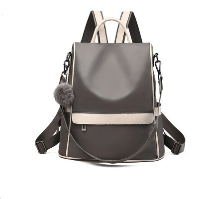 Moderna sieviešu mugursoma ar īsu rokturi un rāvējslēdzēju