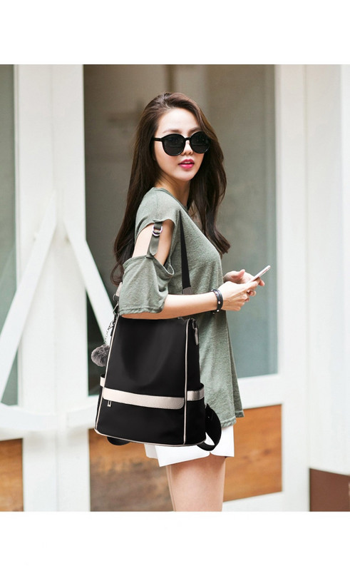 Moderna sieviešu mugursoma ar īsu rokturi un rāvējslēdzēju