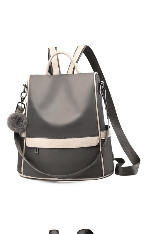 Moderna sieviešu mugursoma ar īsu rokturi un rāvējslēdzēju