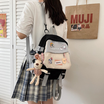 Unisex modeļa tekstila mugursoma ar platām lencēm