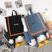 Moderna sieviešu mugursoma ar uzrakstu un rokturiem