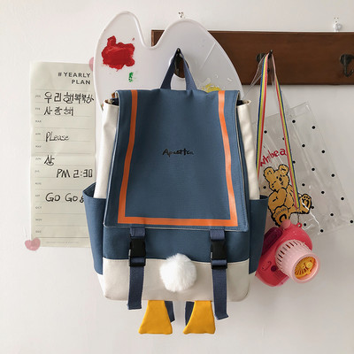 Moderna sieviešu mugursoma ar uzrakstu un rokturiem