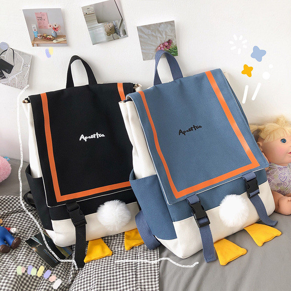 Moderna sieviešu mugursoma ar uzrakstu un rokturiem