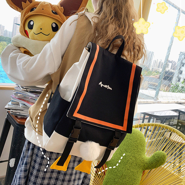 Moderna sieviešu mugursoma ar uzrakstu un rokturiem