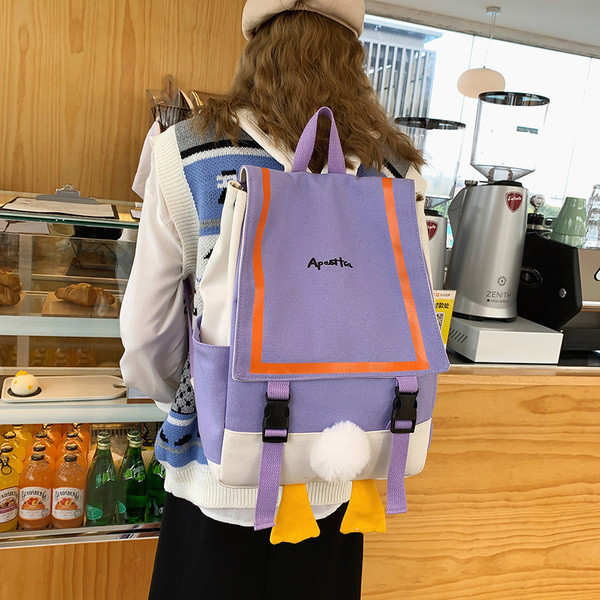 Moderna sieviešu mugursoma ar uzrakstu un rokturiem