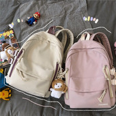 Sieviešu mugursoma ar aksesuāru un priekšējo kabatu