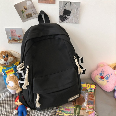 Sieviešu mugursoma ar aksesuāru un priekšējo kabatu