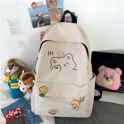 Sieviešu mugursoma ar krāsainu rakstu un aksesuāru