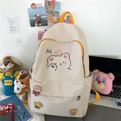 Sieviešu mugursoma ar krāsainu rakstu un aksesuāru