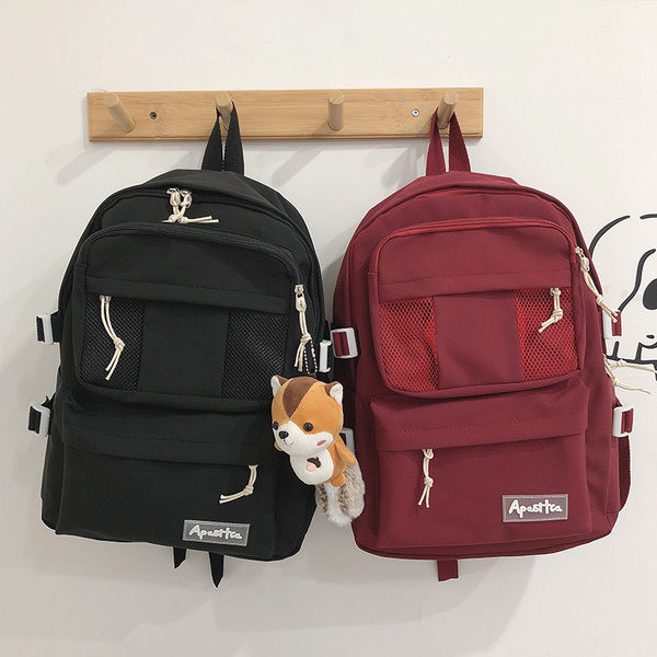 Sieviešu vienkrāsaina mugursoma ar aksesuāru un priekšējo kabatu