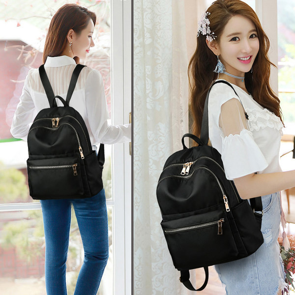 Sieviešu tekstila mugursoma ar priekšējo kabatu melnā krāsā