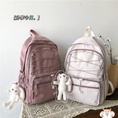 Sieviešu mugursoma ar šņorēm un priekšējo kabatu vairākās krāsās