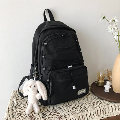 Sieviešu mugursoma ar šņorēm un priekšējo kabatu vairākās krāsās