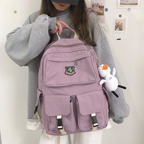 Sieviešu mugursoma ar aksesuāru un kabatām