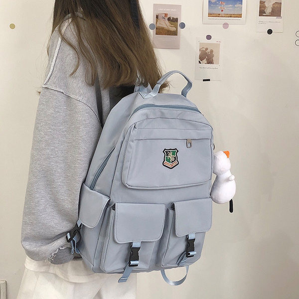 Sieviešu mugursoma ar aksesuāru un kabatām