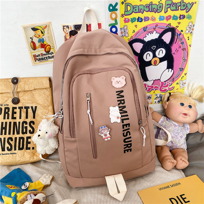 Sieviešu moderna mugursoma ar uzrakstu un rāvējslēdzēju vairākās krāsās