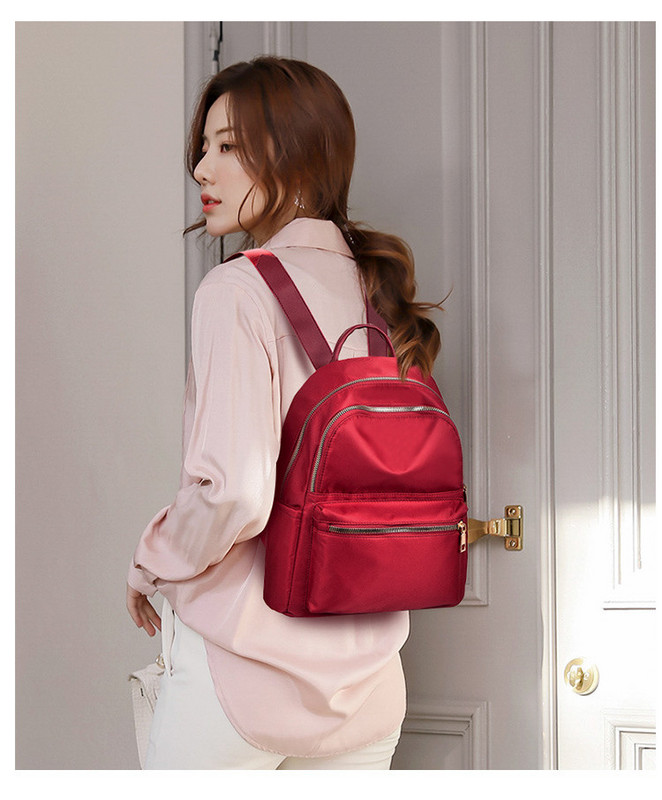 Rucsac de dama cu buzunar frontal si fermoar model simplu