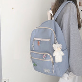 Vienkrāsaina sieviešu mugursoma ar aksesuāru un priekšējo kabatu