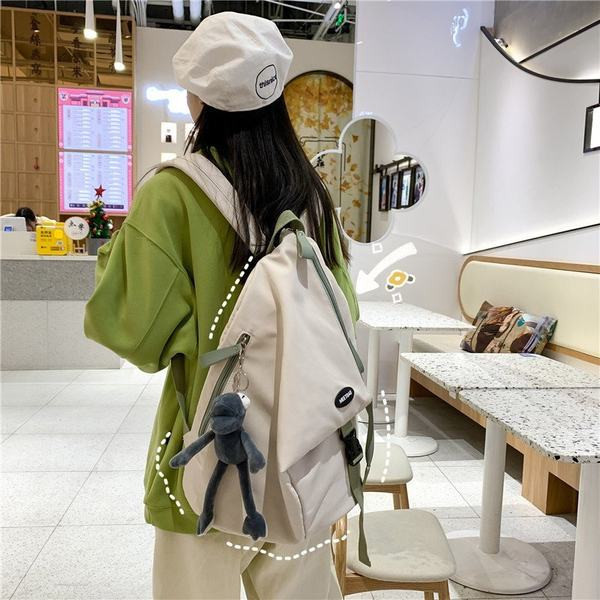 Sieviešu vienkrāsaina mugursoma ar aksesuāru un rāvējslēdzēju