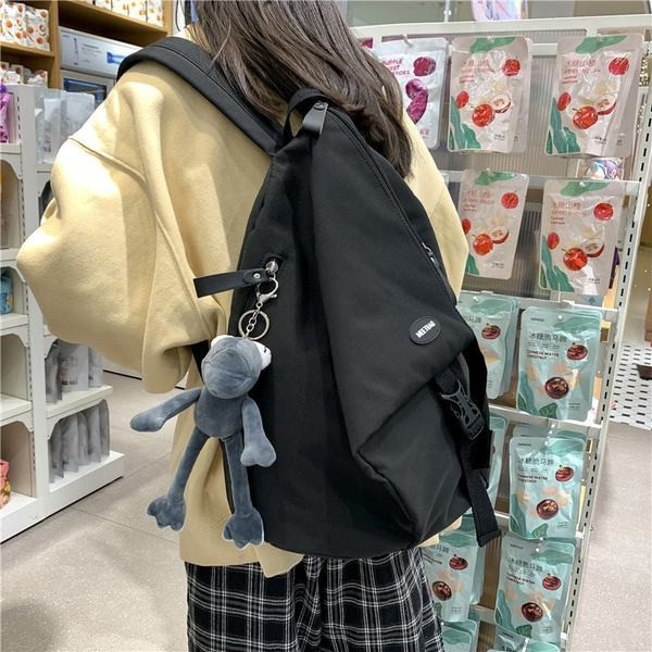 Sieviešu vienkrāsaina mugursoma ar aksesuāru un rāvējslēdzēju