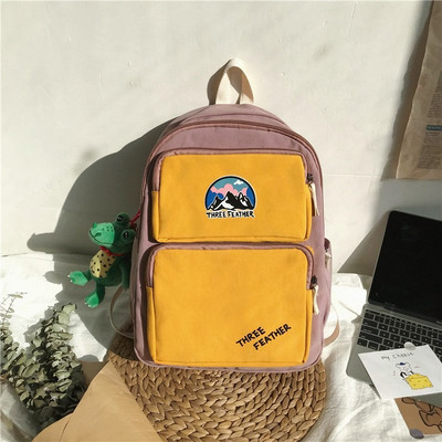 Vienkrāsaina mugursoma ar aksesuāru un priekšējo kabatu