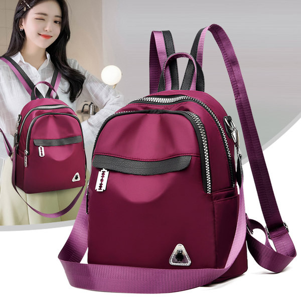 Rucsac de damă modern cu buzunare frontale și cataramă