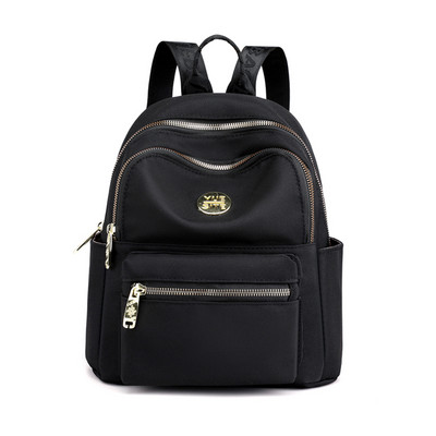 Jauna modeļa maza tekstila mugursoma ar metāla emblēmu