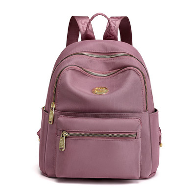 Jauna modeļa maza tekstila mugursoma ar metāla emblēmu