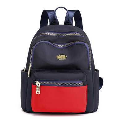 Jauna modeļa maza tekstila mugursoma ar metāla emblēmu