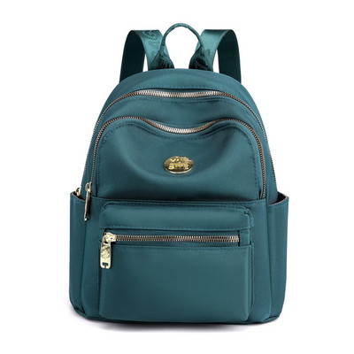 Jauna modeļa maza tekstila mugursoma ar metāla emblēmu