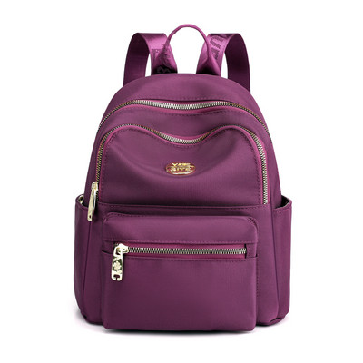 Jauna modeļa maza tekstila mugursoma ar metāla emblēmu