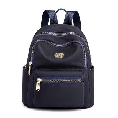 Jauna modeļa maza tekstila mugursoma ar metāla emblēmu