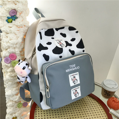 Sieviešu ikdienas mugursoma ar priekšējo kabatu un emblēmu