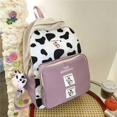 Sieviešu ikdienas mugursoma ar priekšējo kabatu un emblēmu