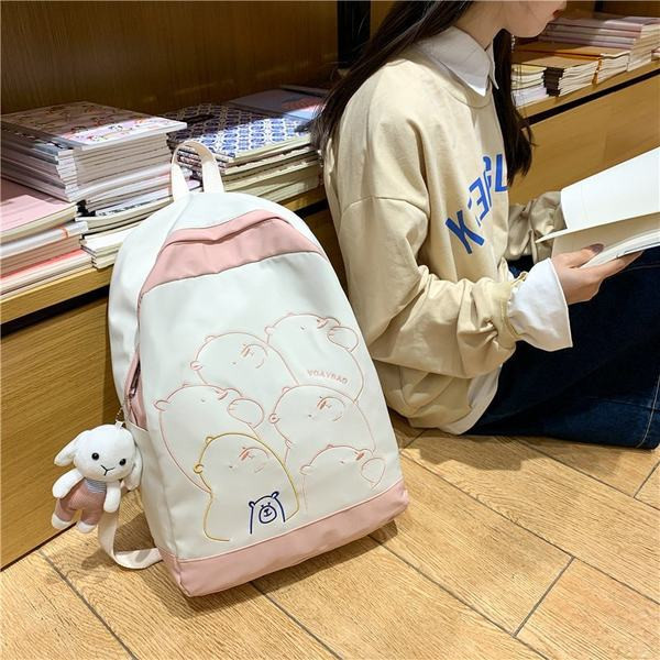 Ženski ruksak s vezom i dodatkom u više boja