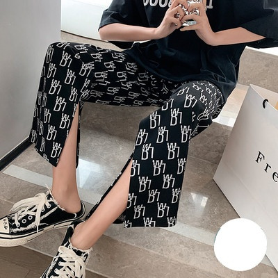 Modernas sieviešu plata modeļa bikses ar šķēlumu